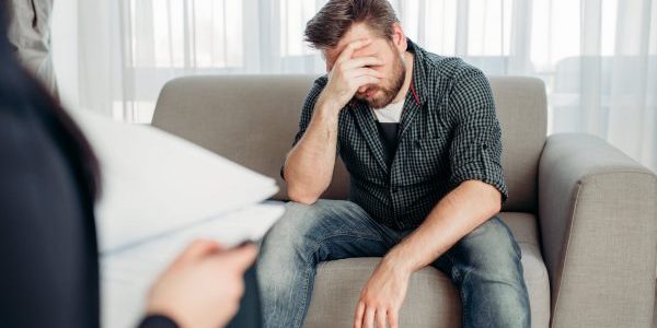 sad-patient-at-psychologist-psychology-support-2021-08-26-16-26-29-utc-min