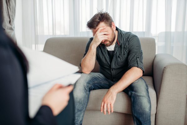 sad-patient-at-psychologist-psychology-support-2021-08-26-16-26-29-utc-min