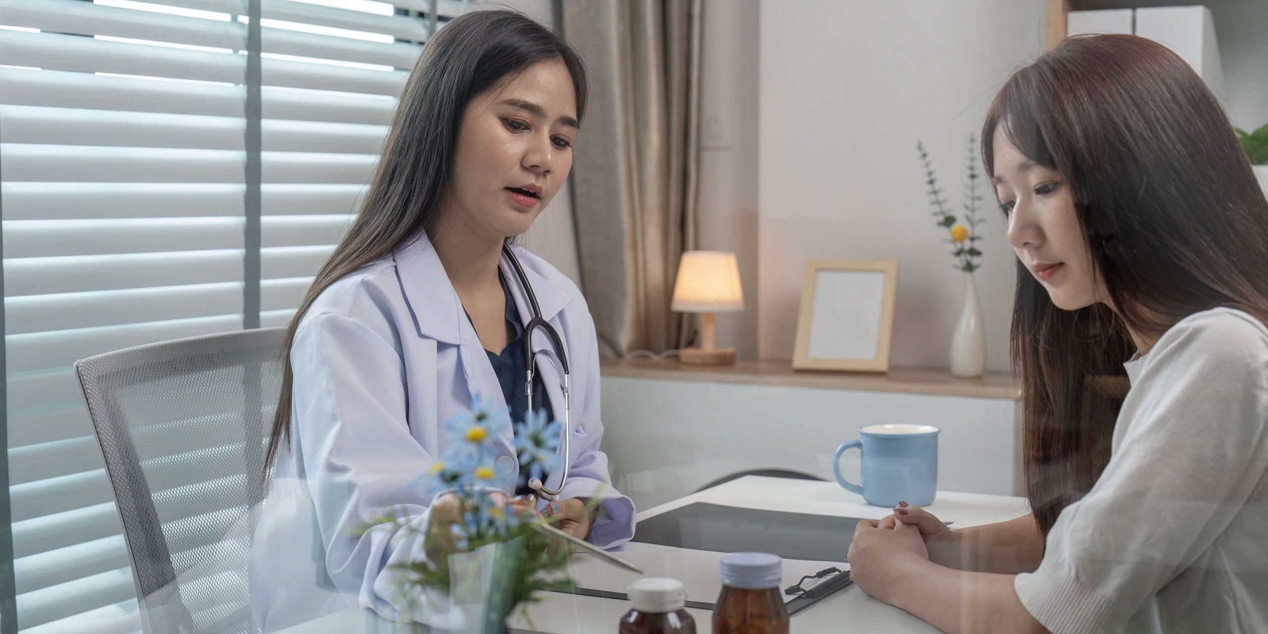 doctor-consulting-patient-in-modern-clinic-office-2024-07-09-04-27-15-utc