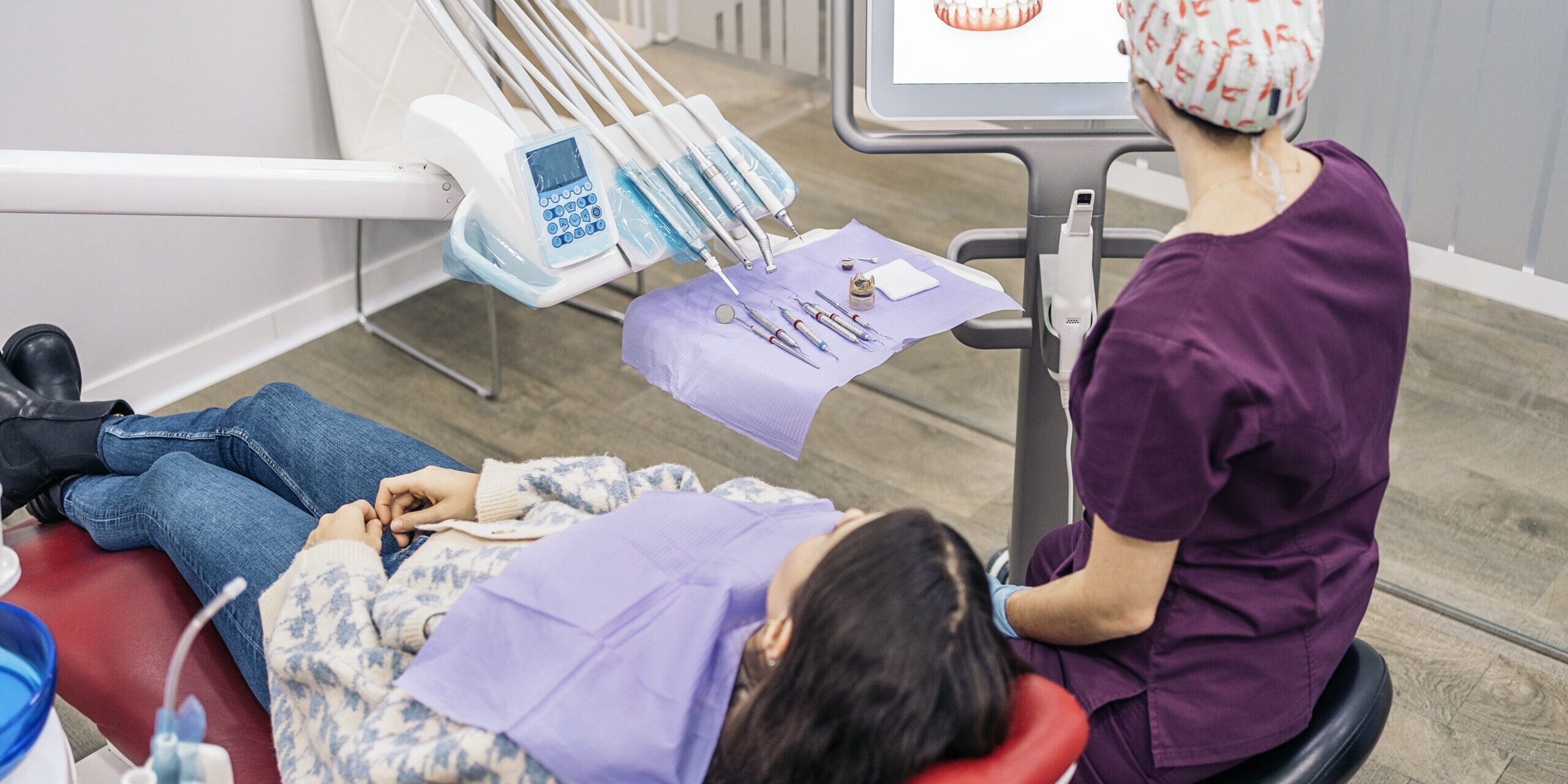 Dental Clinic Worker Looking X-ray