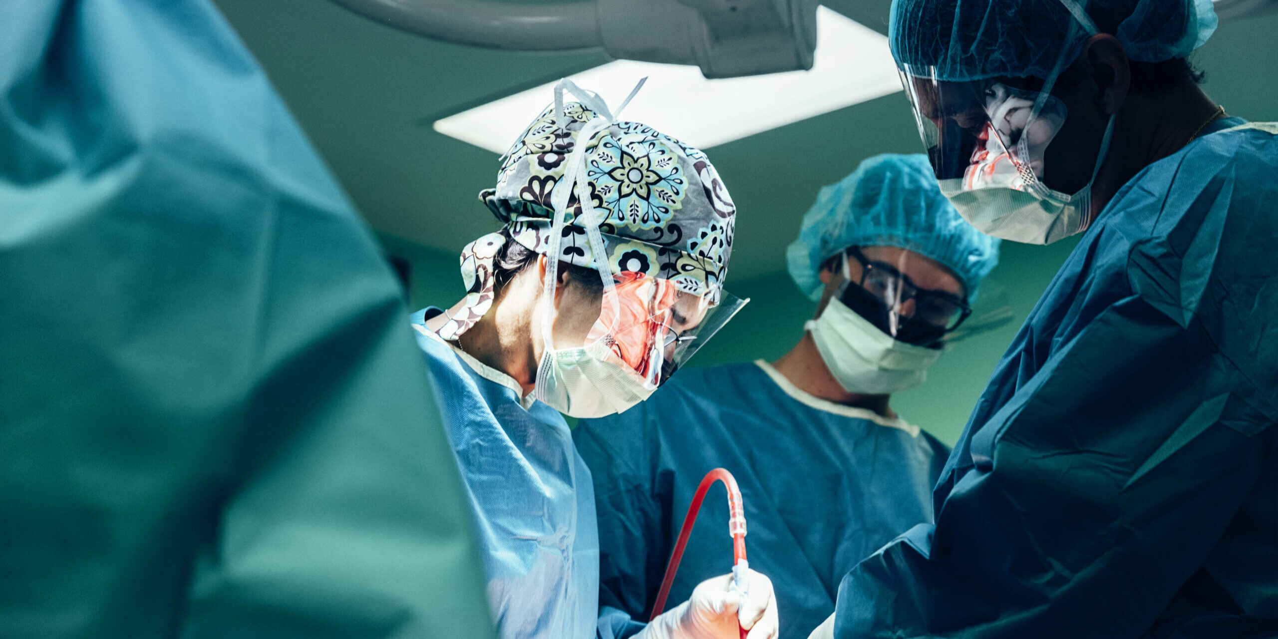 Team of Surgeons Operating.