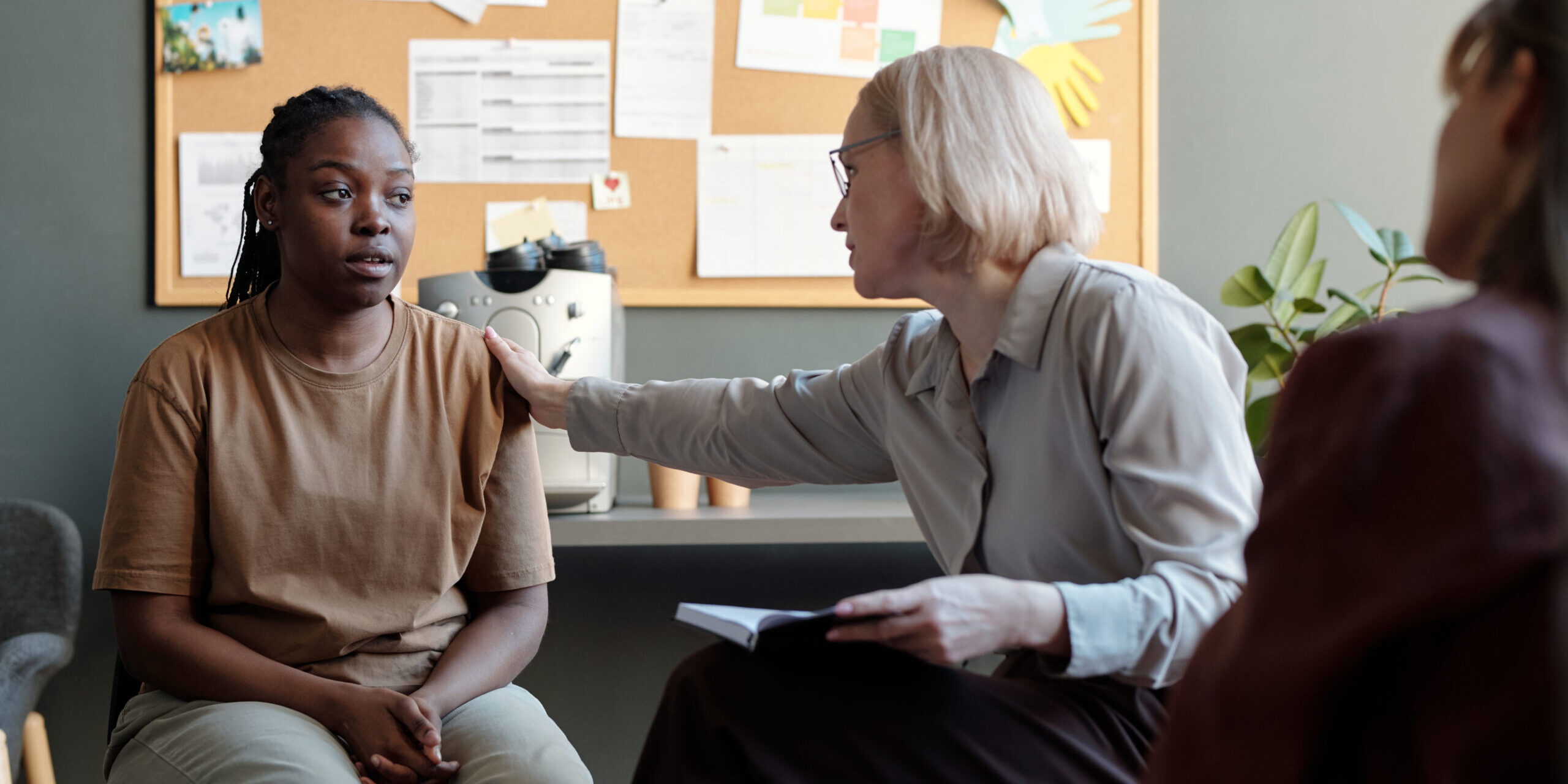 Comforting girl at psychological session